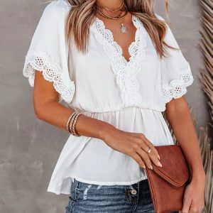 Blusa Nati – Top fluido con encaje y corte peplum